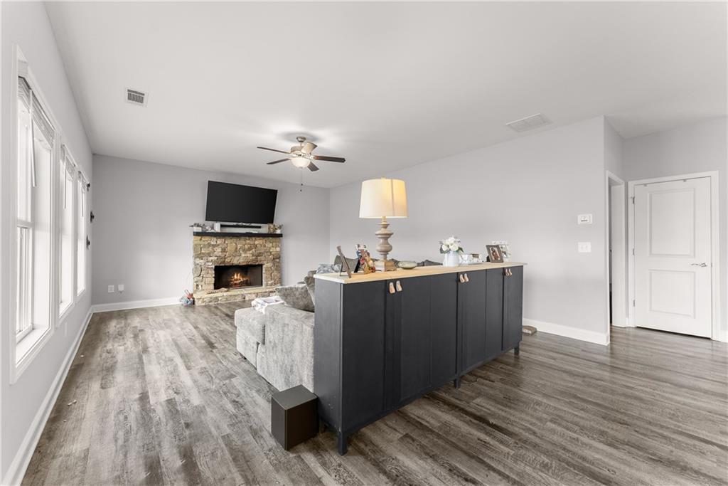 6401 Vista Point Lula, GA 30554 - Photo 18 of 58 a view of kitchen and sink with wooden floor