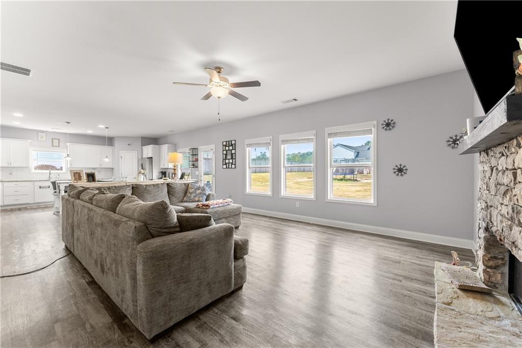 6401 Vista Point Lula, GA 30554 - Photo 20 of 58 a living room with fireplace furniture and a window