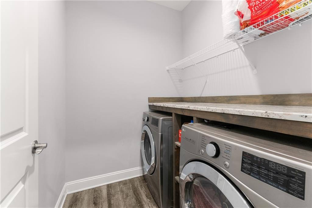 6401 Vista Point Lula, GA 30554 - Photo 23 of 58 a utility room with dryer and washer