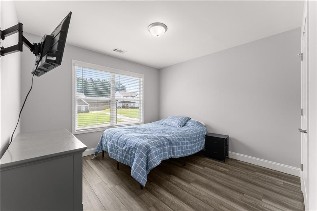 6401 Vista Point Lula, GA 30554 - Photo 25 of 58 a bedroom with a bed and a window