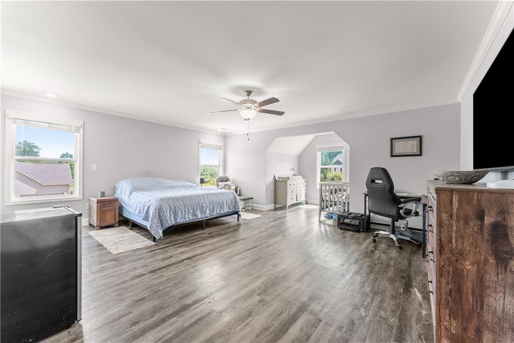 6401 Vista Point Lula, GA 30554 - Photo 31 of 58 a bedroom with a bed window and a desk