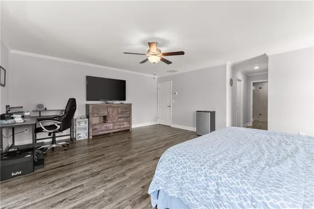 a kitchen that has a sink and chair