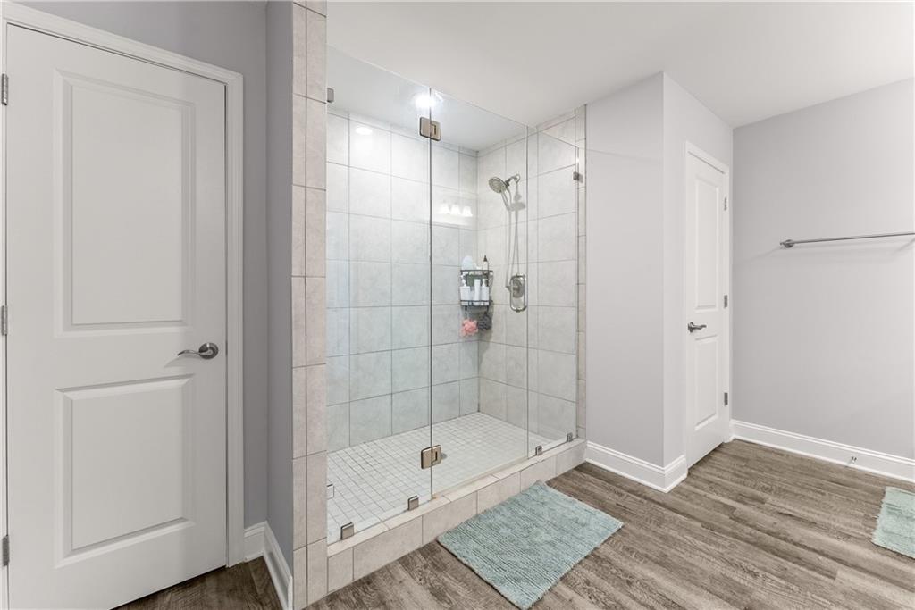 6401 Vista Point Lula, GA 30554 - Photo 37 of 58 a bathroom with a shower and a bathtub