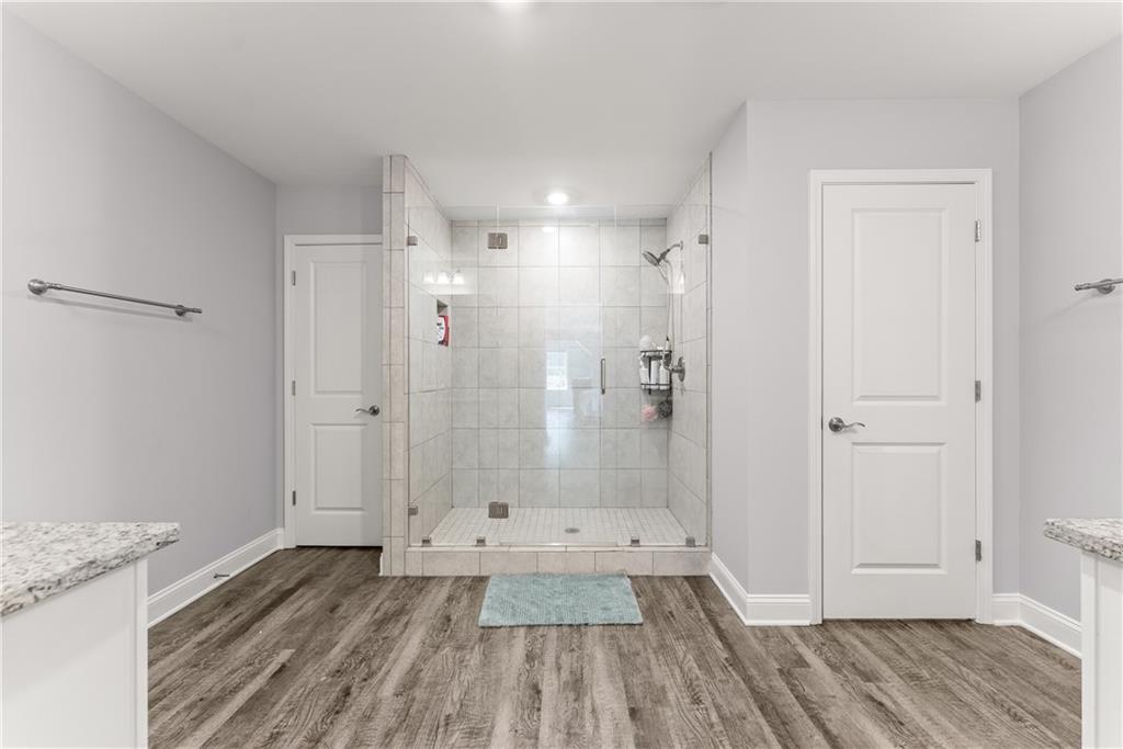 6401 Vista Point Lula, GA 30554 - Photo 38 of 58 a bathroom with a sink and a shower
