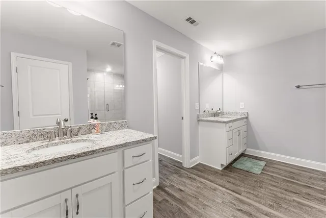 a view of a house with swimming pool and a yard