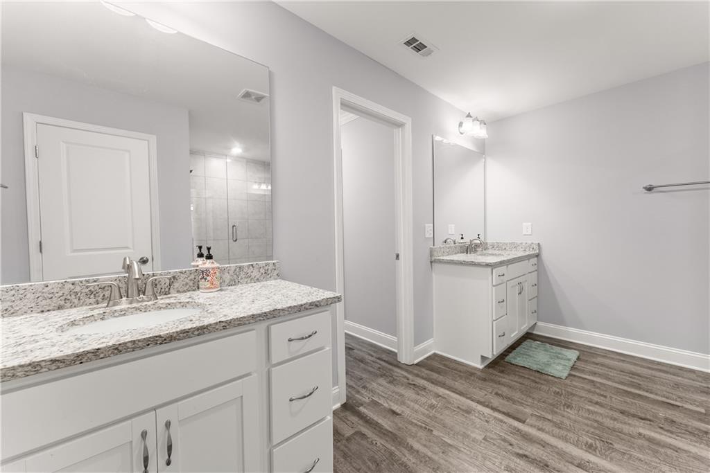 6401 Vista Point Lula, GA 30554 - Photo 39 of 58 a bathroom with a sink and a mirror