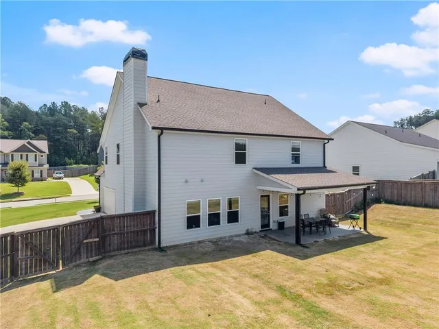 a view of a house with a swimming pool