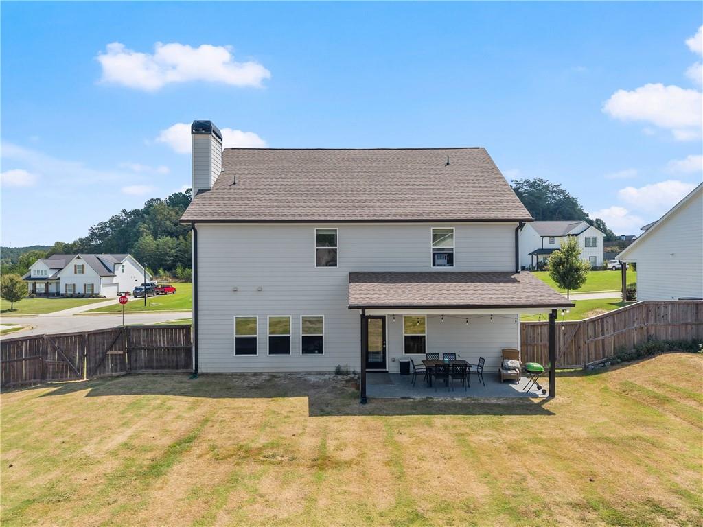 6401 Vista Point Lula, GA 30554 - Photo 43 of 58 a view of a house with swimming pool and sitting area