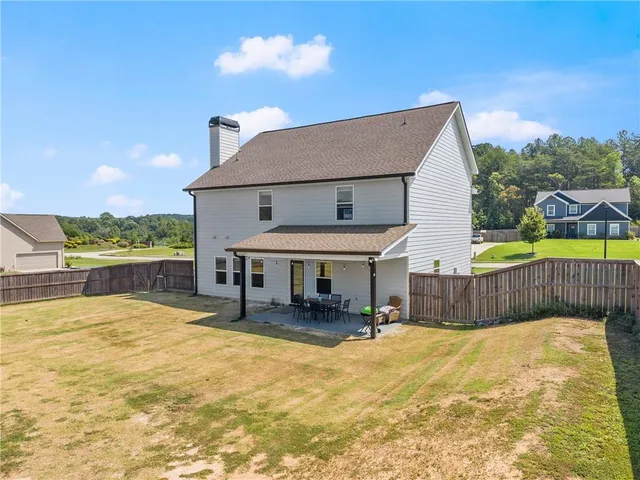 a bathroom with a sink and a yard