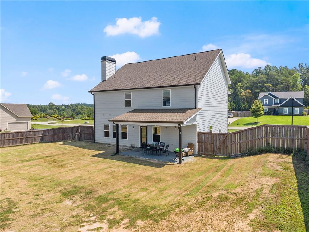 6401 Vista Point Lula, GA 30554 - Photo 44 of 58 a view of a house with swimming pool and sitting area