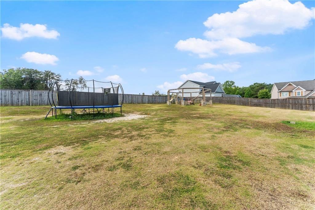 6401 Vista Point Lula, GA 30554 - Photo 48 of 58 a view of a large body of water with a building in the background