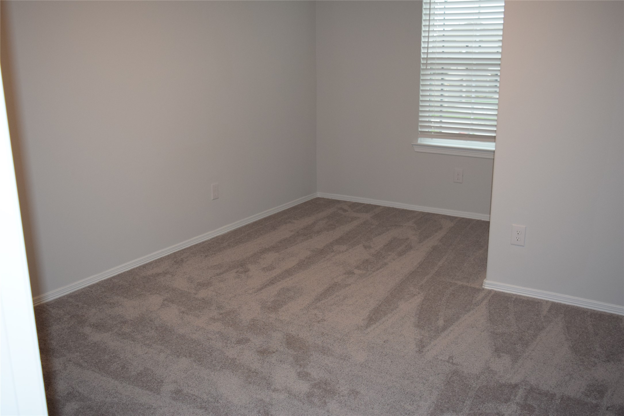 5835 Fresh View Court Katy, TX 77493 - Photo 15 of 21 an empty room with a window