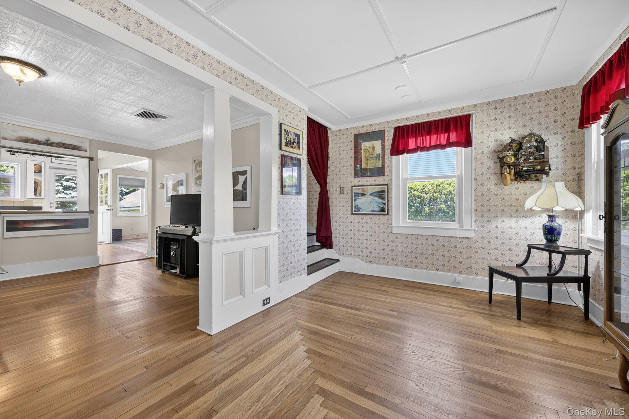 250 Rombout Avenue Beacon, NY 12508 - Photo 7 of 33 a view of a livingroom with wooden floor and furniture