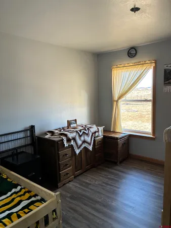 a work room with furniture and window