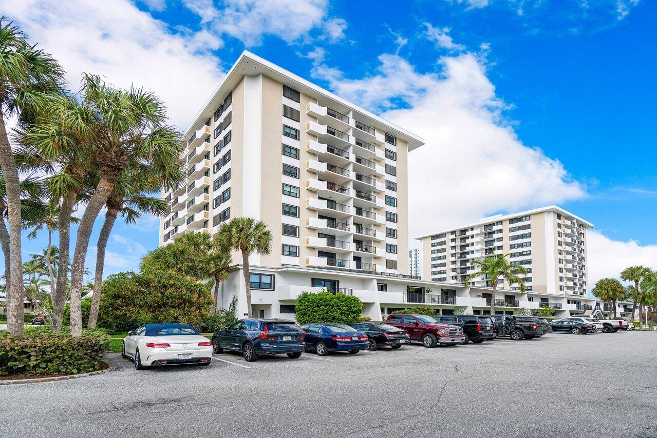 1200 Marine Way, Unit 915 (PH7) North Palm Beach, FL 33408 - Photo 2 of 29 a cars parked in front of a building