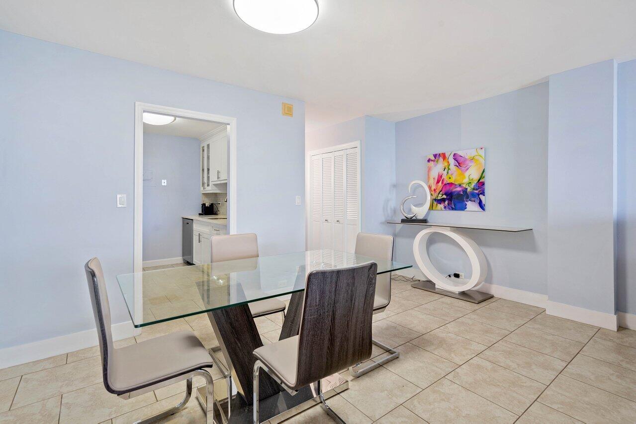 1200 Marine Way, Unit 915 (PH7) North Palm Beach, FL 33408 - Photo 7 of 29 a view of a dining room with furniture