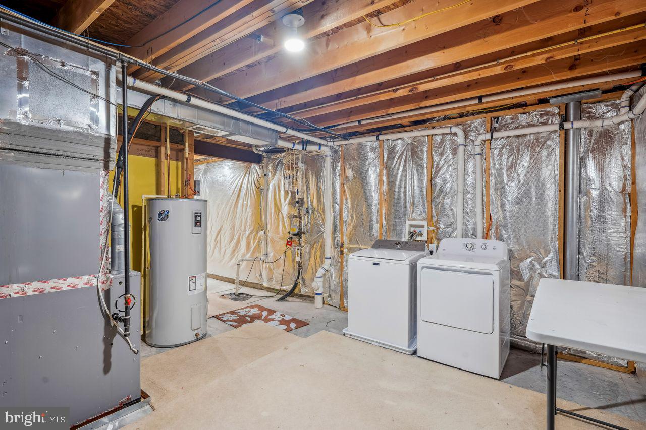 9585 Chaton Road Laurel, MD 20723 - Photo 34 of 38 Laundry Room and storage