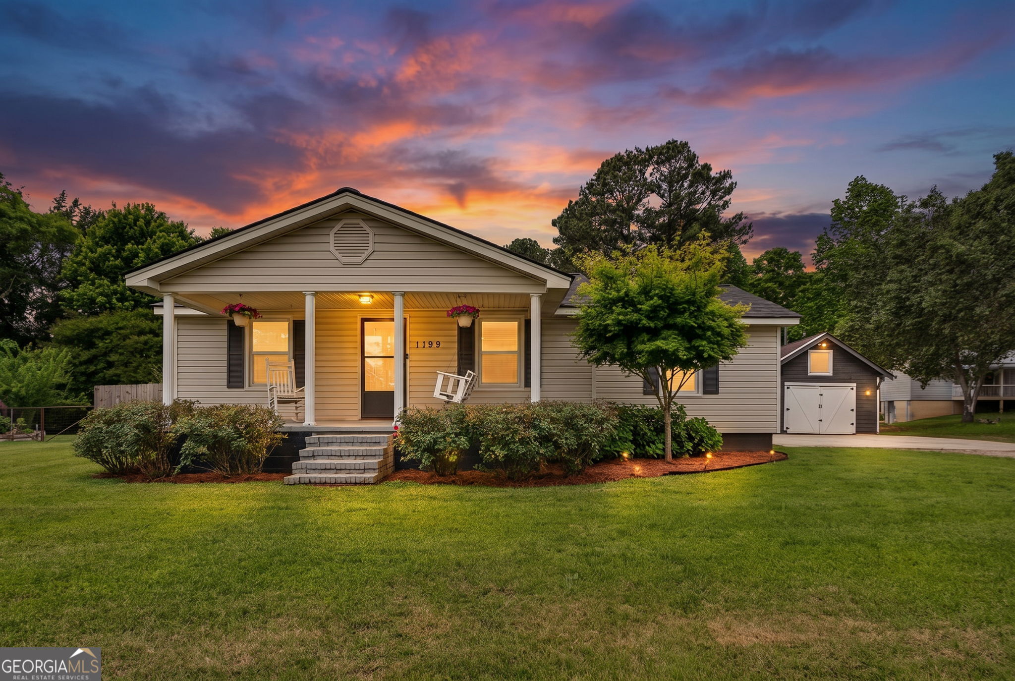 1199 Youngs Mill Road LaGrange, GA 30241 - Photo 1 of 33 a front view of a house with garden
