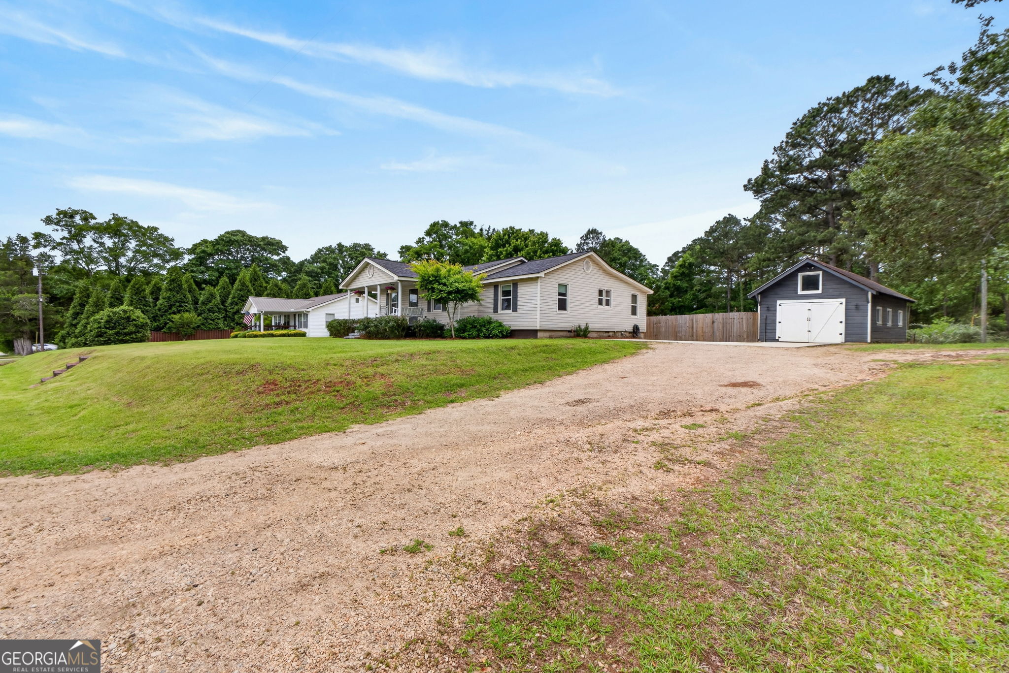1199 Youngs Mill Road LaGrange, GA 30241 - Photo 4 of 33 a house view with a garden space