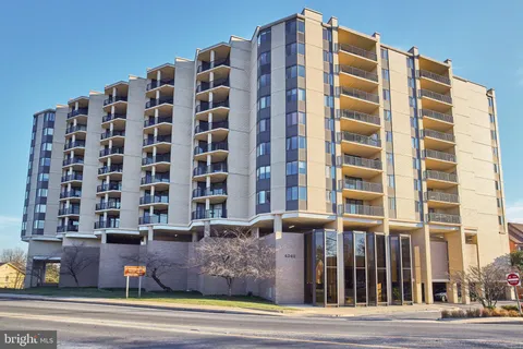 a view of a building with a street
