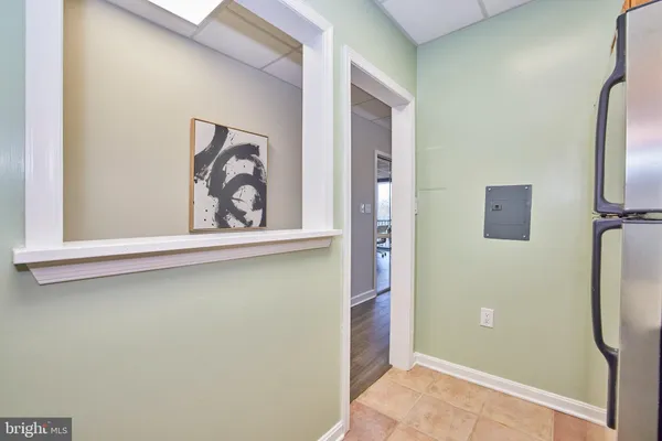 a front door view of a utility room