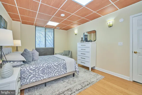 a bedroom with a bed and a walk in closet
