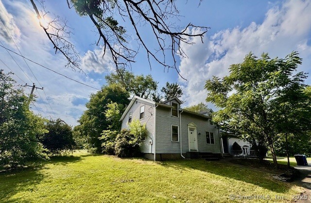 73 South Road Farmington, CT 06032 - Photo 8 of 8 a view of a house with a yard
