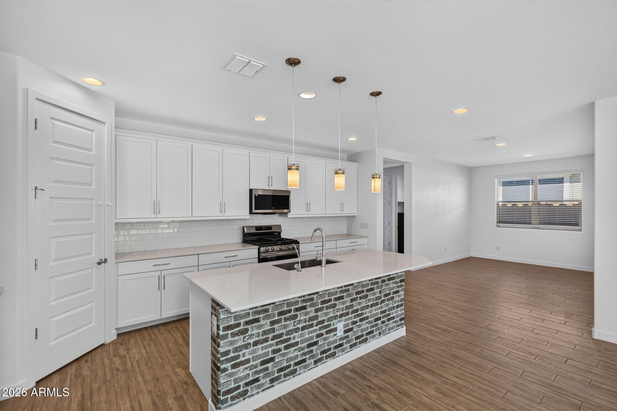 1651 West Estes Way Phoenix, AZ 85041 - Photo 5 of 36 Kitchen plus formal dining