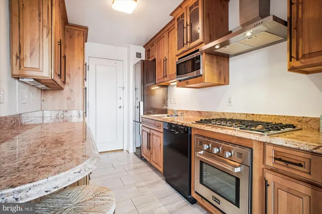 a view of a living room and entryway
