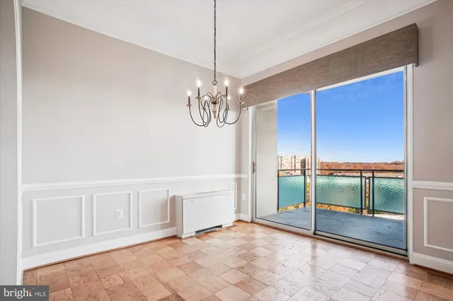a kitchen with stainless steel appliances granite countertop a stove and a refrigerator