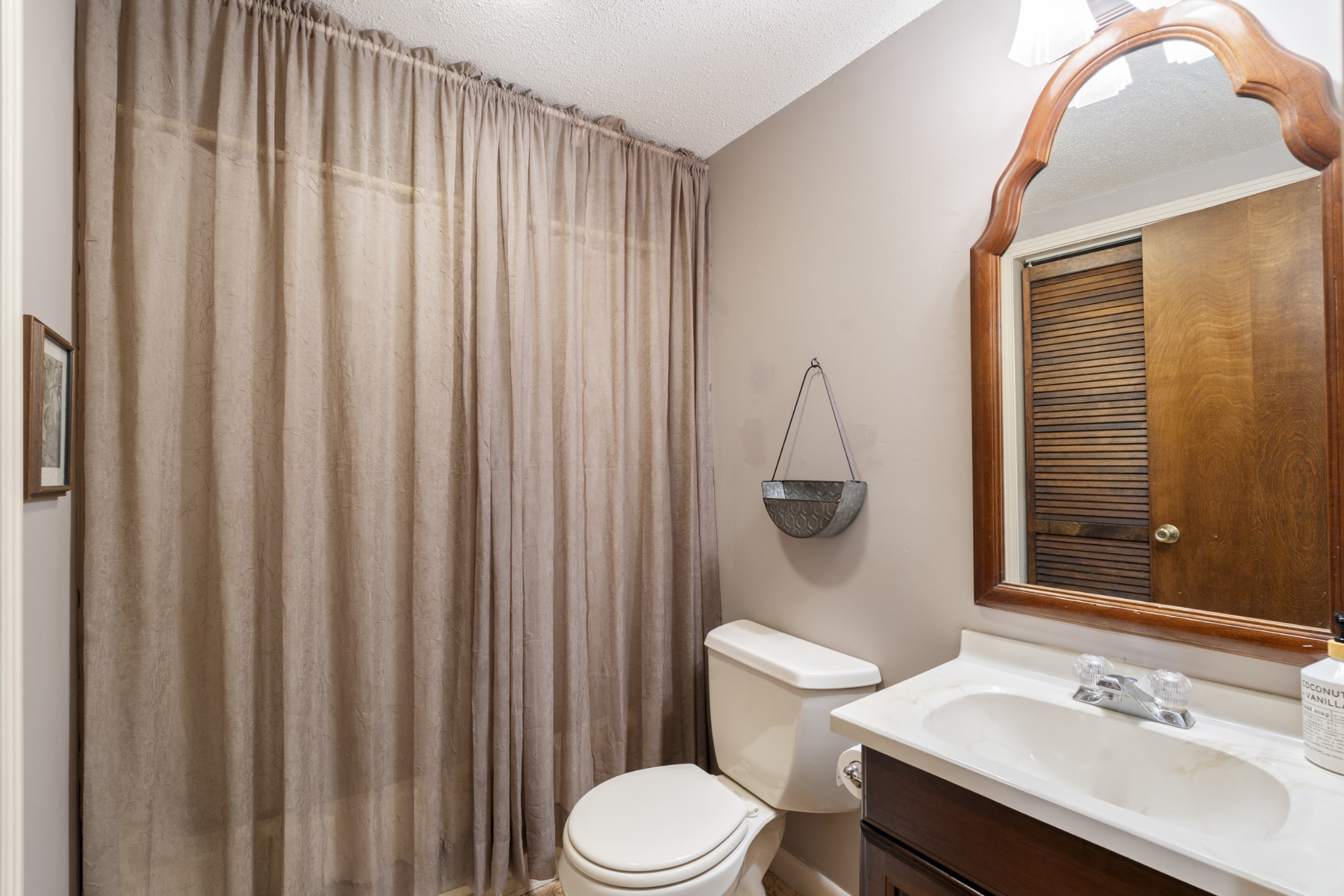 954 Belmont Road Manchester, TN 37355 - Photo 21 of 42 a bathroom with a sink a toilet and shower