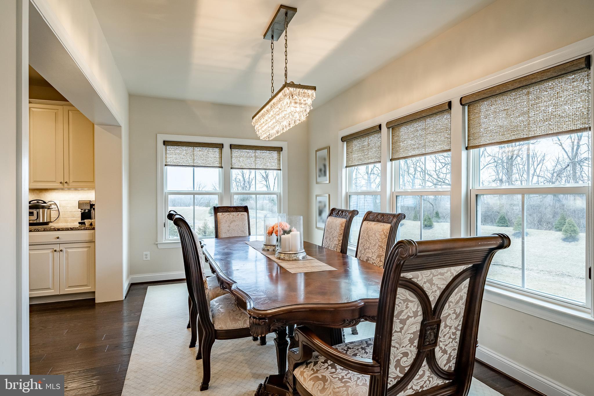 422 Quarry Point Road Malvern, PA 19355 - Photo 13 of 46 a view of a dining room with furniture window and outside view