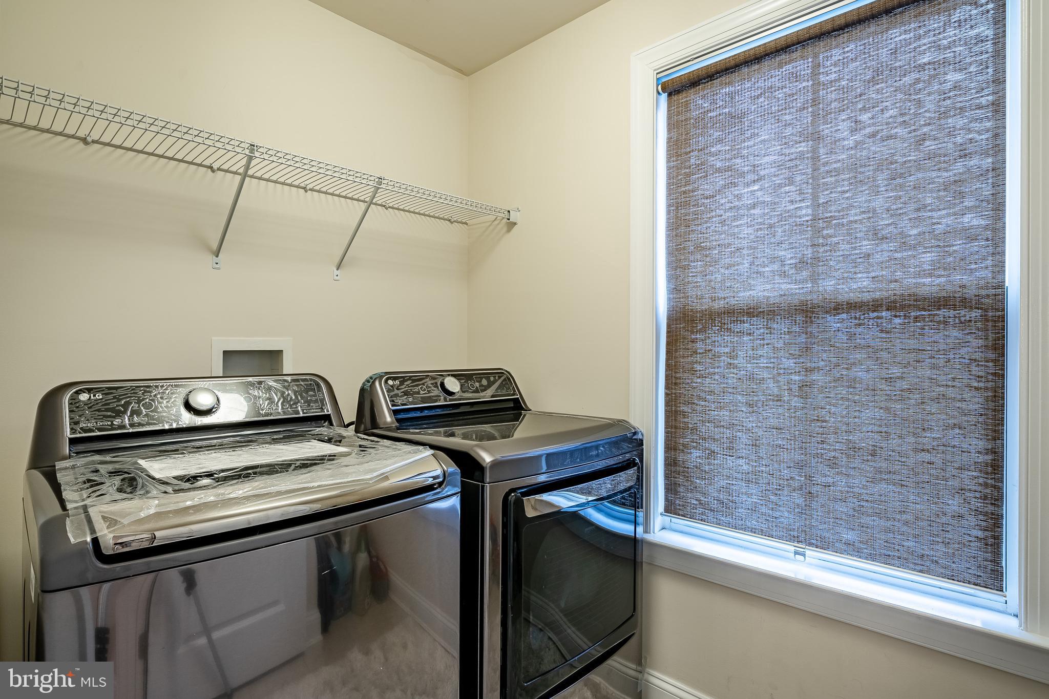422 Quarry Point Road Malvern, PA 19355 - Photo 17 of 46 a utility room with dryer and washer