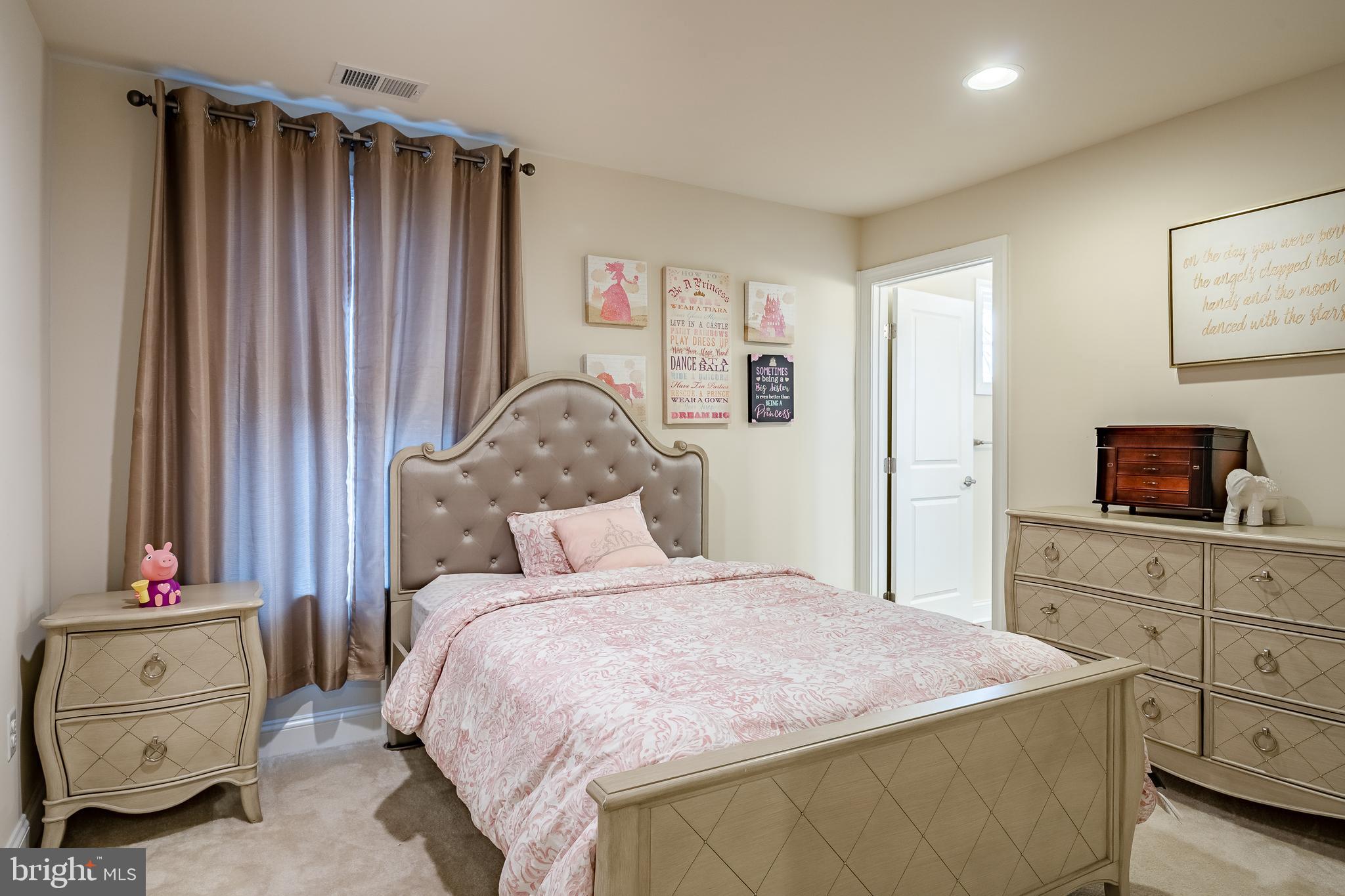 422 Quarry Point Road Malvern, PA 19355 - Photo 24 of 46 a bedroom with a large bed and a flat tv screen on dresser