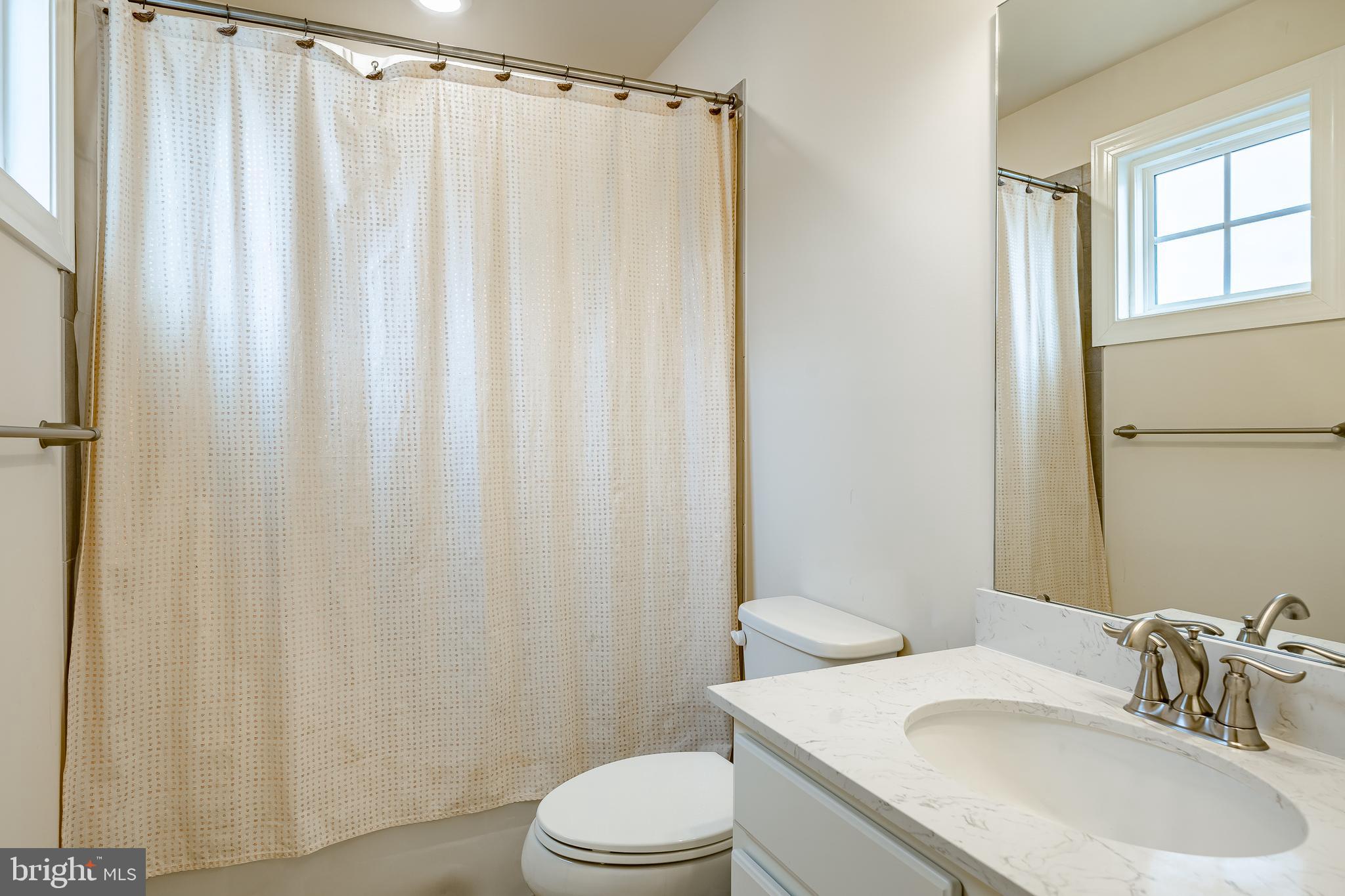422 Quarry Point Road Malvern, PA 19355 - Photo 26 of 46 a bathroom with a sink toilet and shower