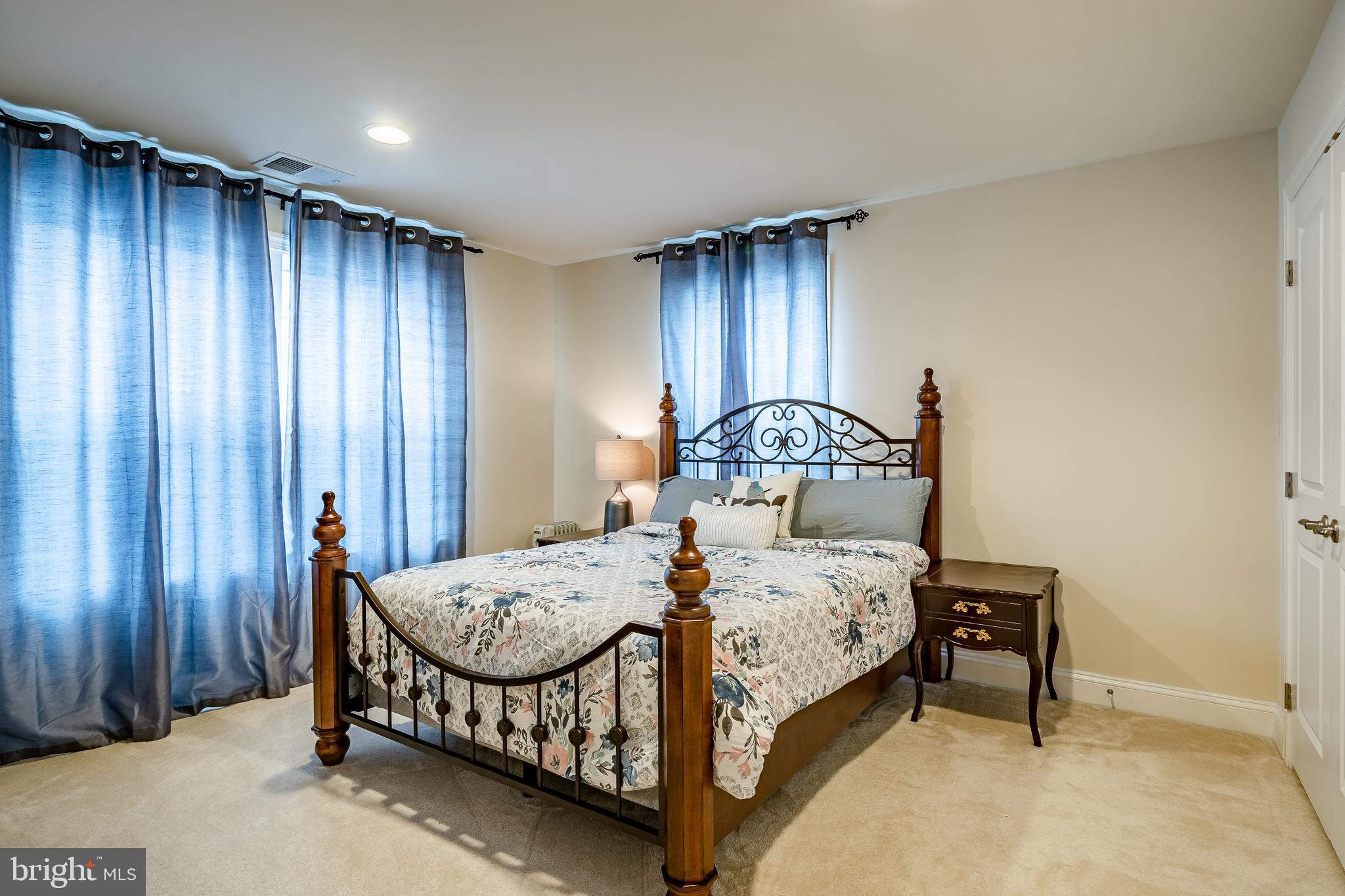 422 Quarry Point Road Malvern, PA 19355 - Photo 27 of 46 a bedroom with a bed a mirror and bed