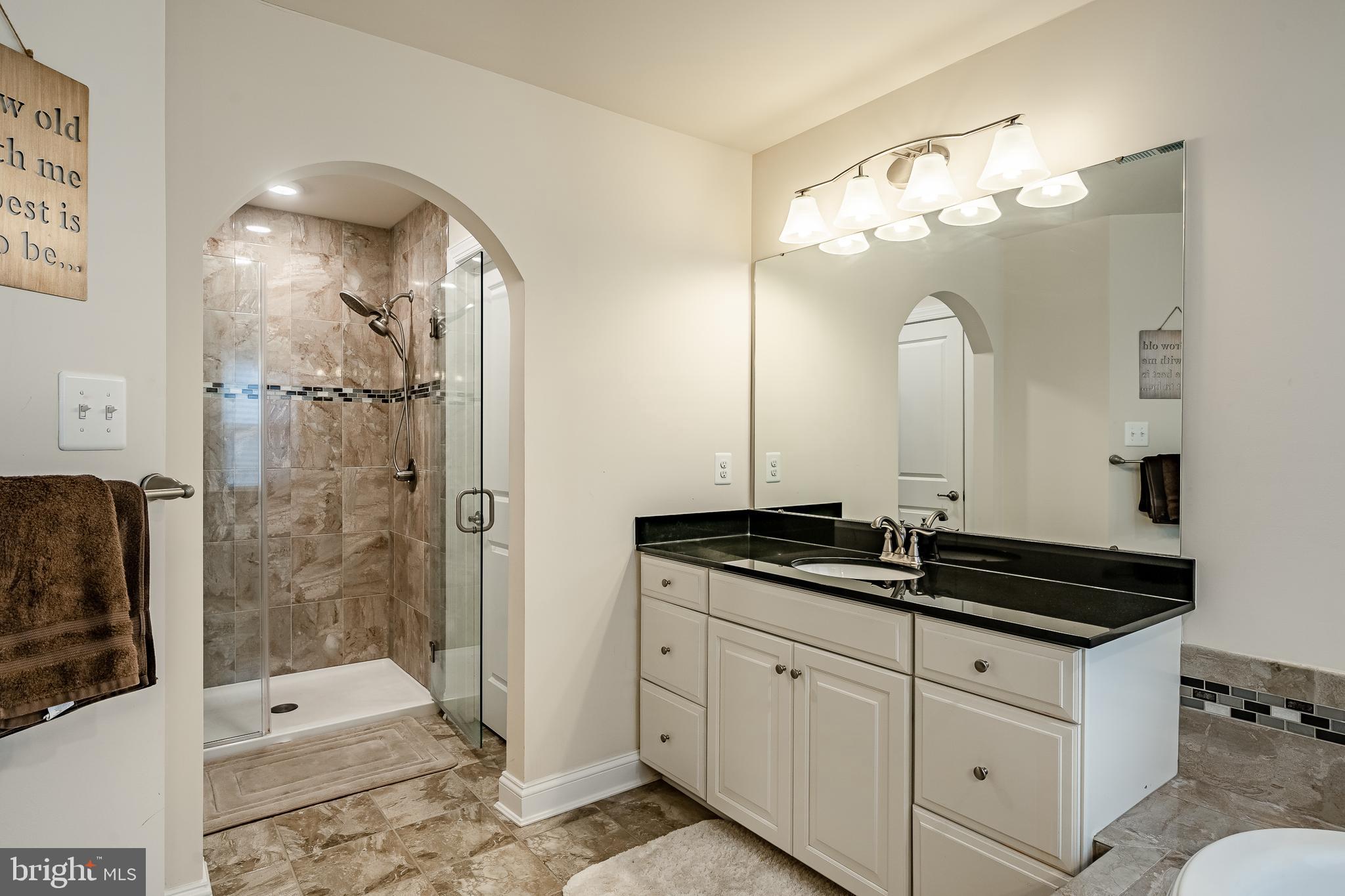 422 Quarry Point Road Malvern, PA 19355 - Photo 33 of 46 a bathroom with a sink and a mirror