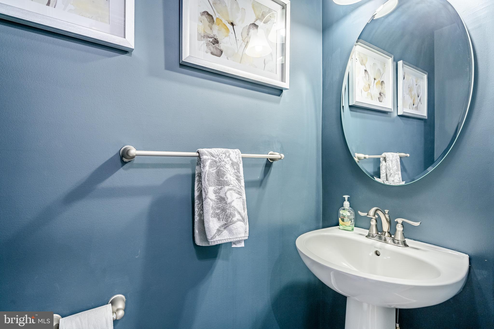 422 Quarry Point Road Malvern, PA 19355 - Photo 41 of 46 a bathroom with a sink and a mirror