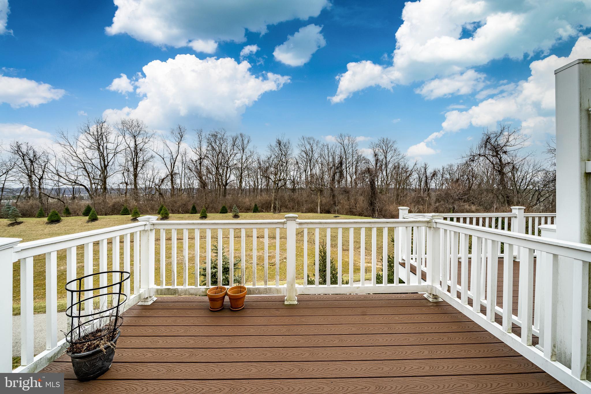 422 Quarry Point Road Malvern, PA 19355 - Photo 42 of 46 a view of a balcony with wooden fence