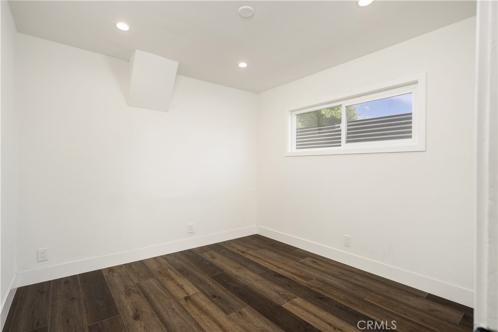 38859 Mesquite Road Palmdale, CA 93551 - Photo 13 of 36 a view of empty room with wooden floor