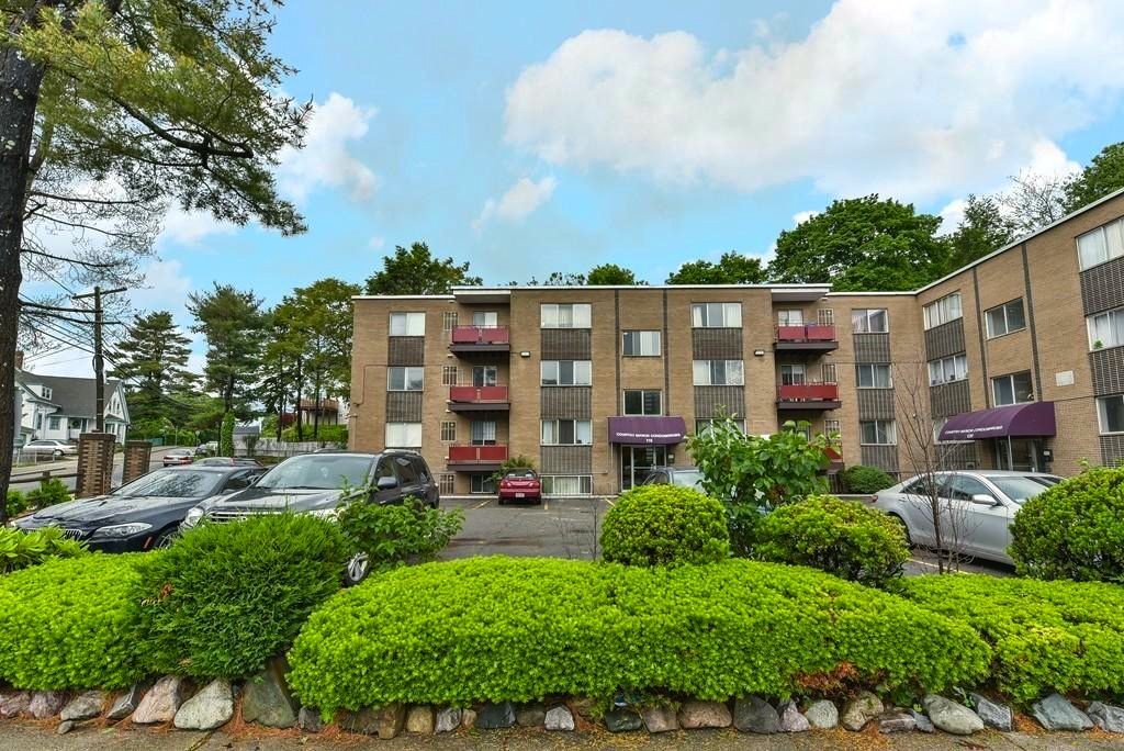 120 Bradlee Street, Unit 2 Boston, MA 02136 - Photo 1 of 12 a view of a building with garden and trees