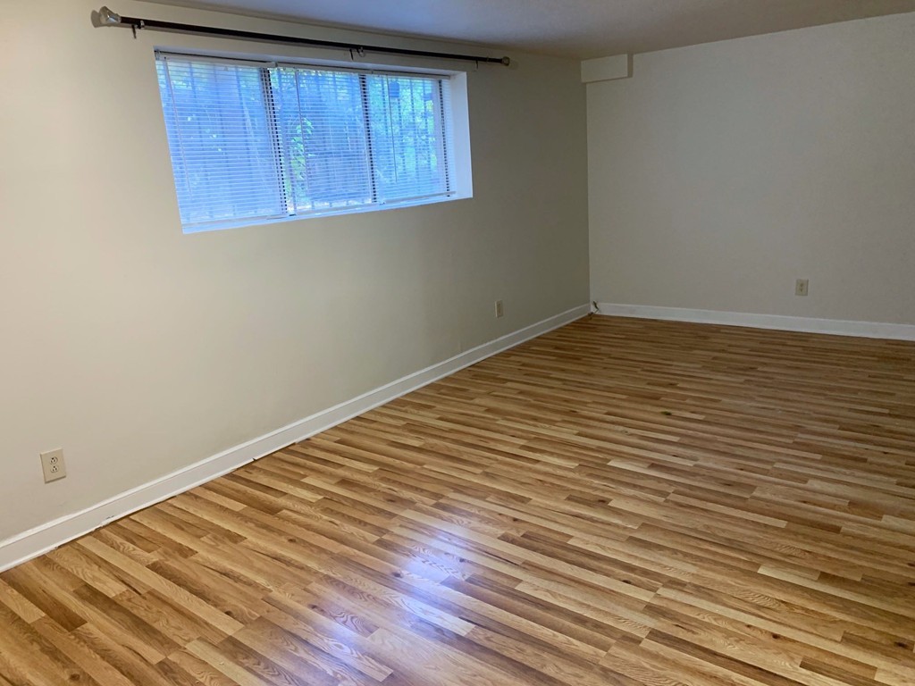 120 Bradlee Street, Unit 2 Boston, MA 02136 - Photo 11 of 12 a view of a room with wooden floor