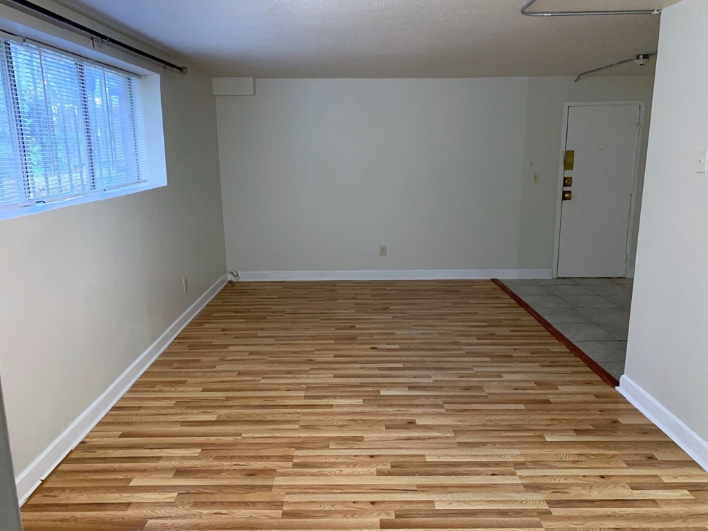 120 Bradlee Street, Unit 2 Boston, MA 02136 - Photo 3 of 12 a view of a hallway with wooden floor