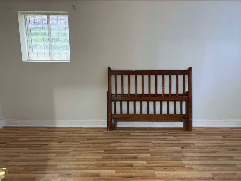 120 Bradlee Street, Unit 2 Boston, MA 02136 - Photo 10 of 12 a view of wooden floor and a window