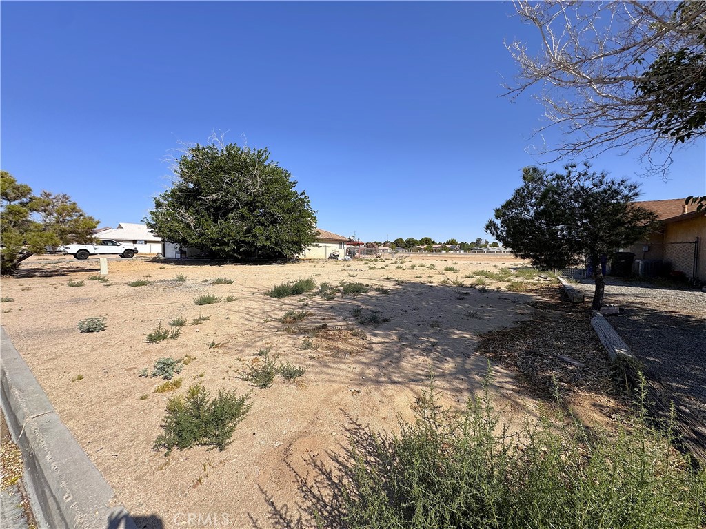 14040 Rivers Edge Road Helendale, CA 92342 - Photo 1 of 1 a view of a road with a snow on the road