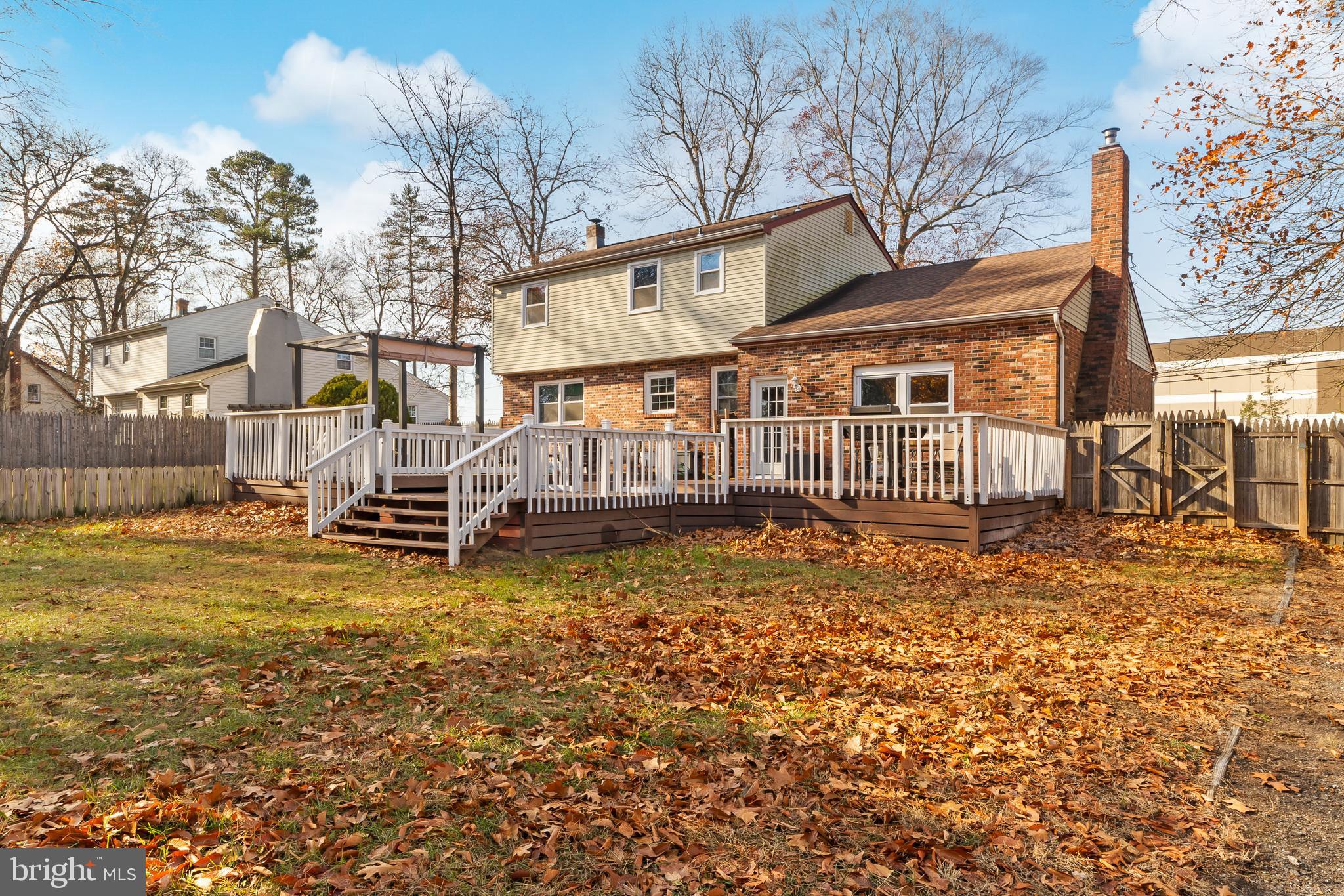 341 Birmingham Road Pemberton, NJ 08068 - Photo 27 of 31 a backyard of a house with barbeque oven table and chairs