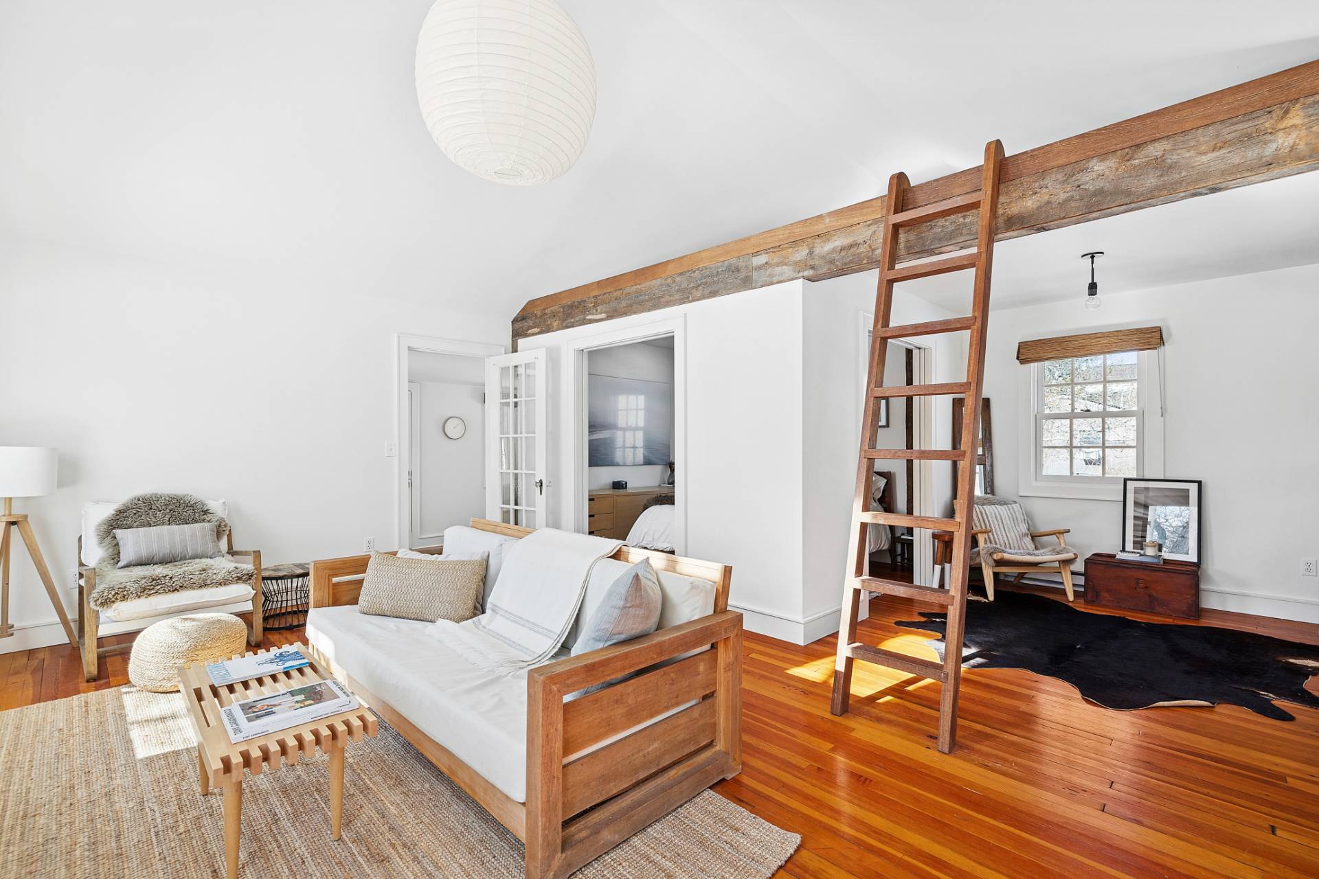 12 Jackson Road Montauk, NY 11954 - Photo 5 of 38 a living room with furniture and wooden floor