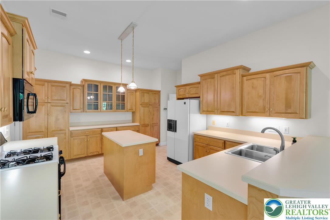 268 Jefferson Place Bethlehem, PA 18020 - Photo 15 of 49 a kitchen that has a sink and a stove