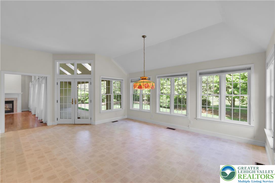 268 Jefferson Place Bethlehem, PA 18020 - Photo 18 of 49 a view of an empty room with a fireplace and a large window