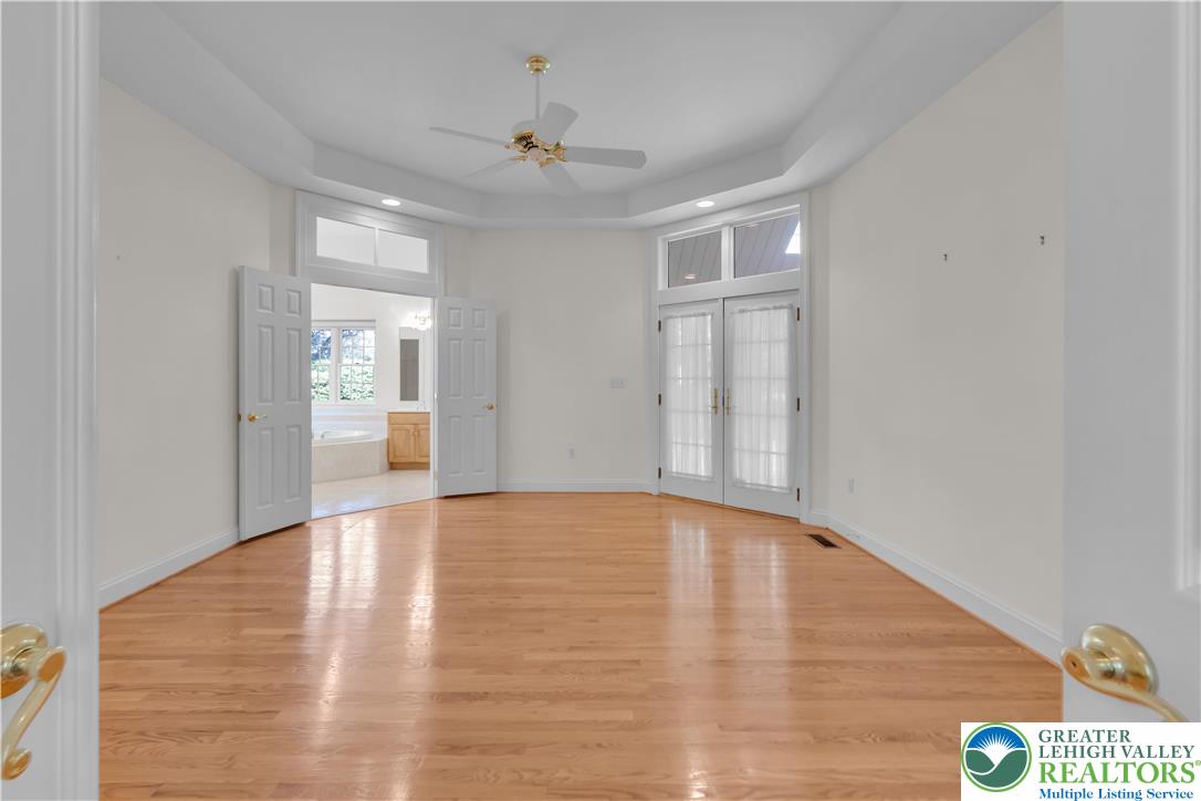 268 Jefferson Place Bethlehem, PA 18020 - Photo 20 of 49 a view of an empty room with window and wooden floor